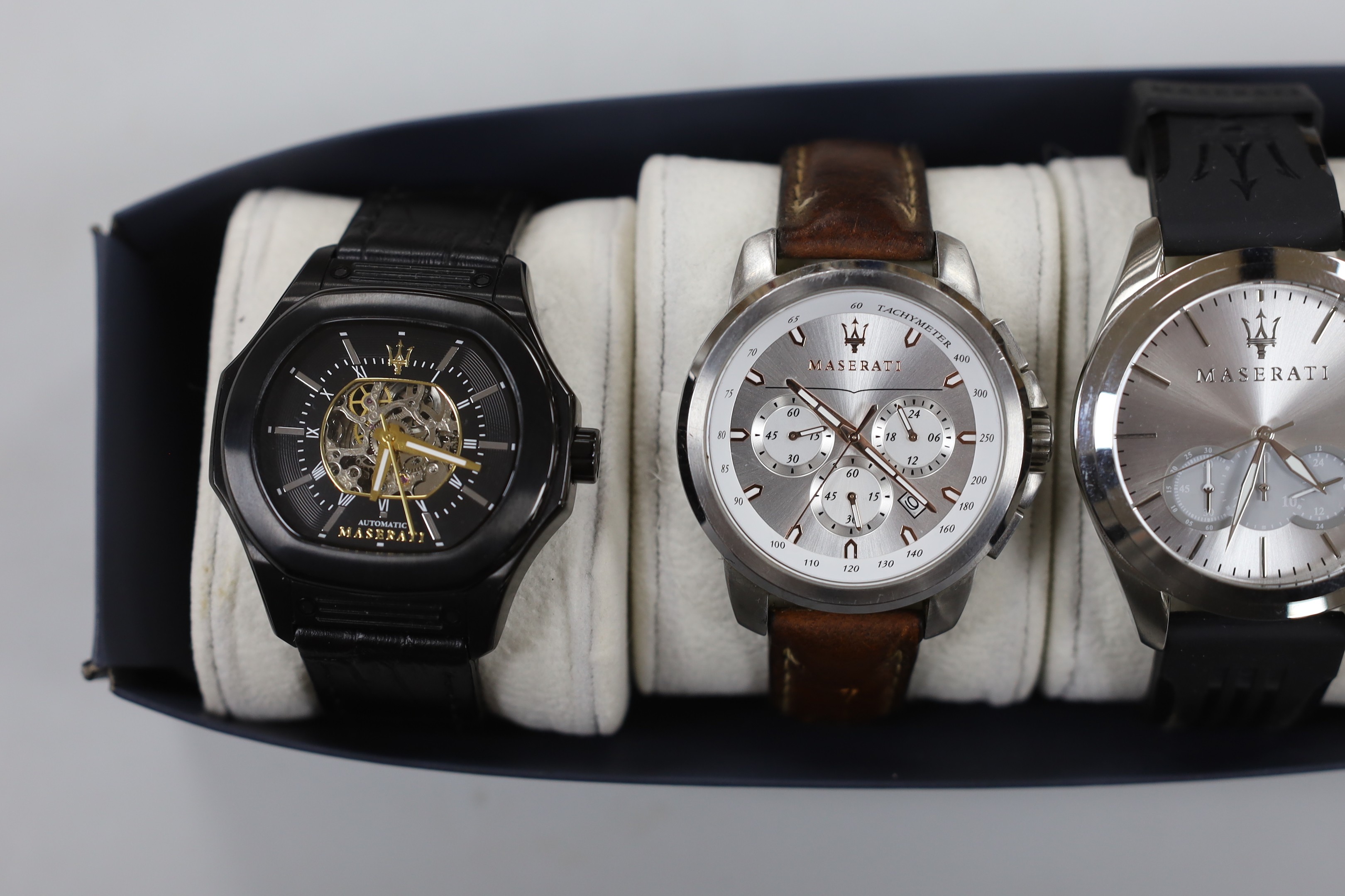 Three gentleman's assorted modern stainless steel Maserati wrist watches including automatic and quartz and a git metal Belvedere Profession watch.